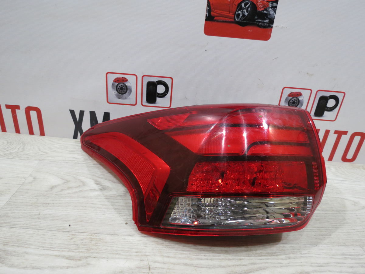 Фонарь задний наружный левый Mitsubishi Outlander (GF0W) III (2012–2014)