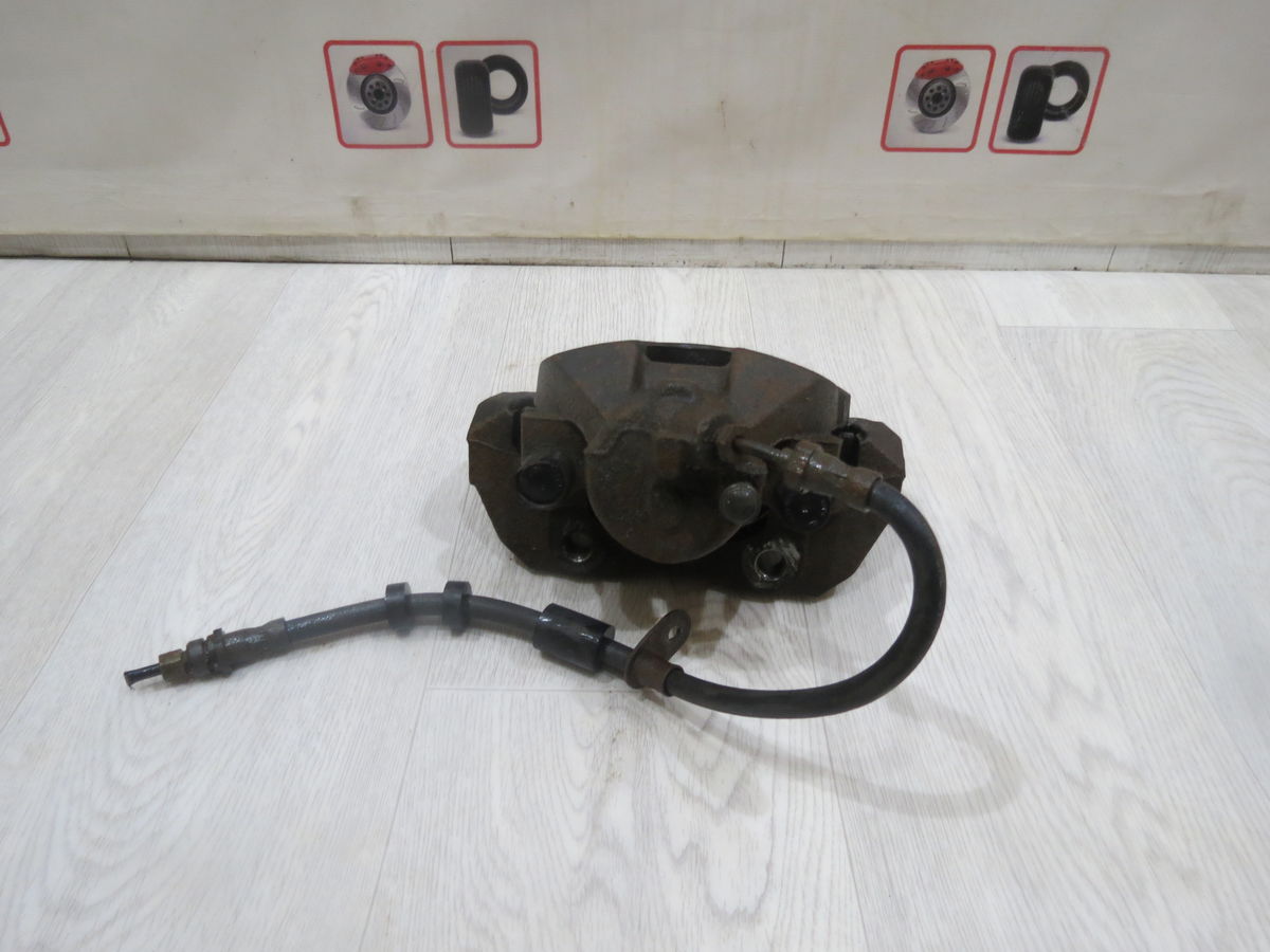 Суппорт тормозной передний правый Ford Focus (III) III (2010–2015)