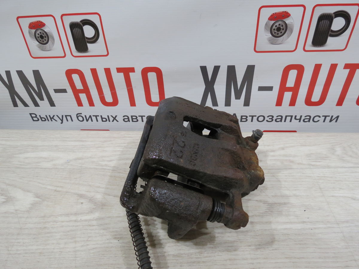Суппорт тормозной передний Kia Rio (QB) III (2011–2015)