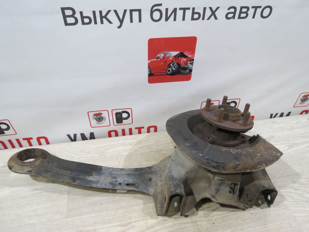 Кулак поворотный задний левый Mazda 3 (BK) I рестайлинг (2006–2009)
